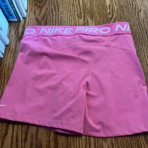Pink Nike pros